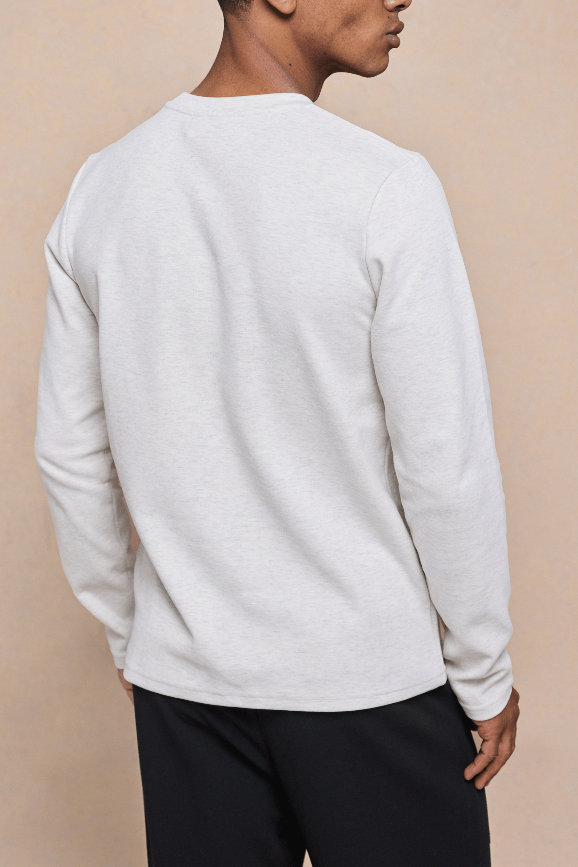 Tyler Langarm-T-Shirt mit Tasche – Steinmeliert