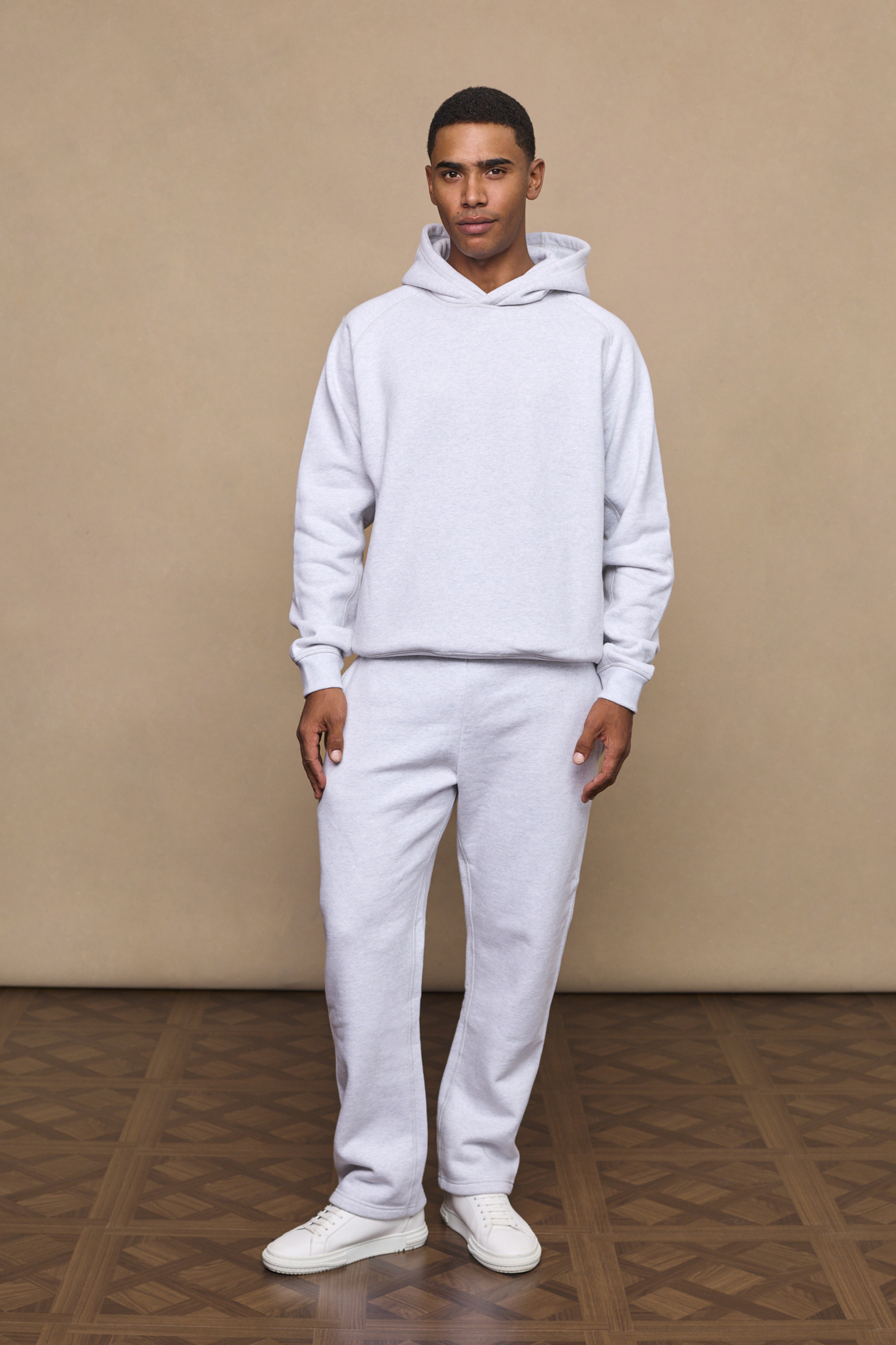 Men’s heavyweight cotton blend hoodie in grey with raglan sleeves by Raith